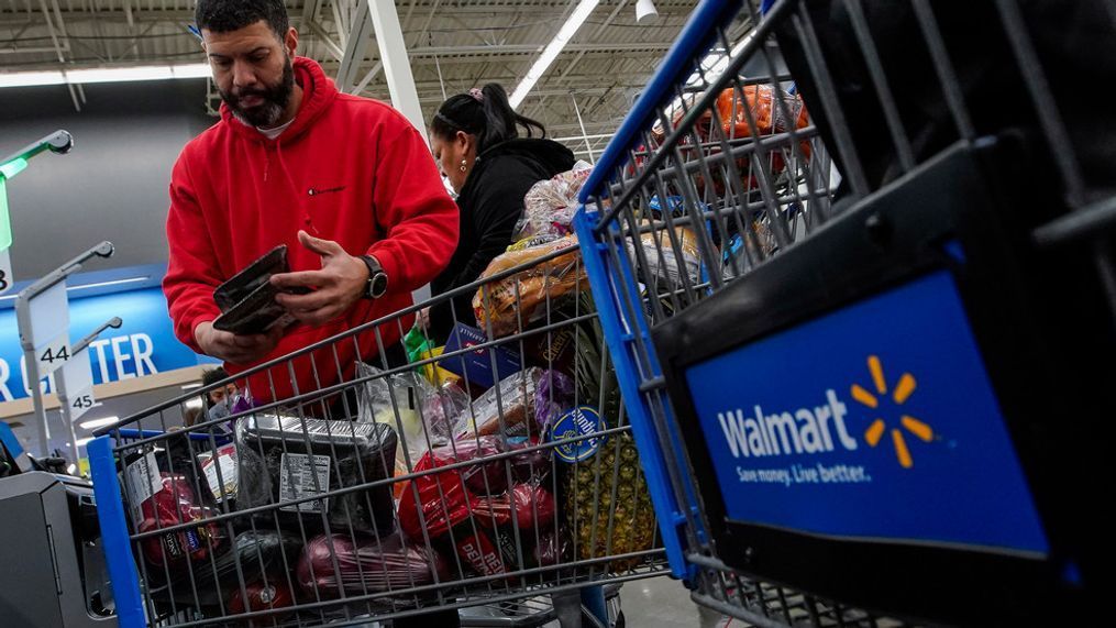 Francisco Santana shops at the Walmart Supercenter in North Bergen, N.J., on Thursday, Feb. 9, 2023. (AP Photo/Eduardo Munoz Alvarez)
