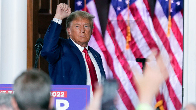 FILE - Former President Donald Trump gestures after speaking at Trump National Golf Club in Bedminster, N.J., June 13, 2023, after pleading not guilty in a Miami courtroom earlier in the day to dozens of felony counts that he hoarded classified documents and refused government demands to give them back. (AP Photo/Andrew Harnik, File)