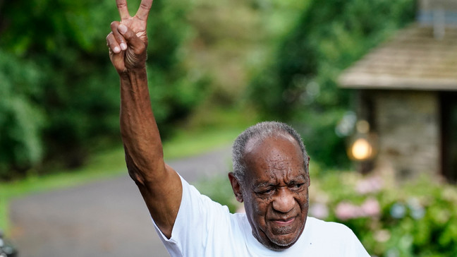 FILE - Bill Cosby gestures outside his home in Elkins Park, Pa., Wednesday, June 30, 2021, after being released from prison. (AP Photo/Matt Rourke)
