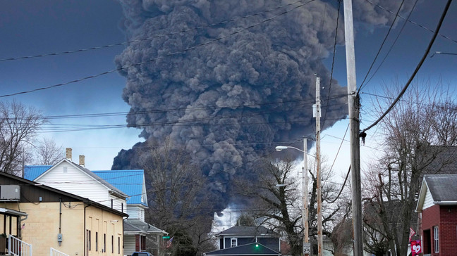 FILE - A black plume rises over East Palestine, Ohio, as a result of a controlled detonation of a portion of the derailed Norfolk Southern trains, Feb. 6, 2023. (AP Photo/Gene J. Puskar, File)